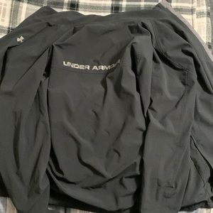 Under armor sports zip up jacket.